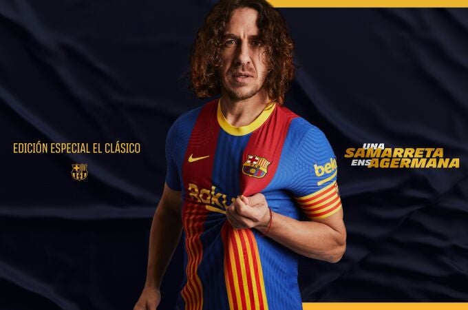 Puyol posa con la camiseta que el Barcelona lucirá en el clásico