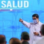 Caracas (Venezuela), 26/01/2021.- A handout photo made available by the Miraflores press shows Venezuelan President Nicolas Maduro in a government act in Caracas, Venezuela, 26 January 2021. The president of Venezuela, Nicolas Maduro, rectified his statement, when he asserted that the drug Carvativir 'neutralizes 100 percent' the COVID-19 disease, and now said that the product developed in the Caribbean country is 'complementary' in the fight against the SARS-COV-2 virus. EFE/EPA/Miraflores press / HANDOUT MANDATORY CREDIT HANDOUT EDITORIAL USE ONLY/NO SALES