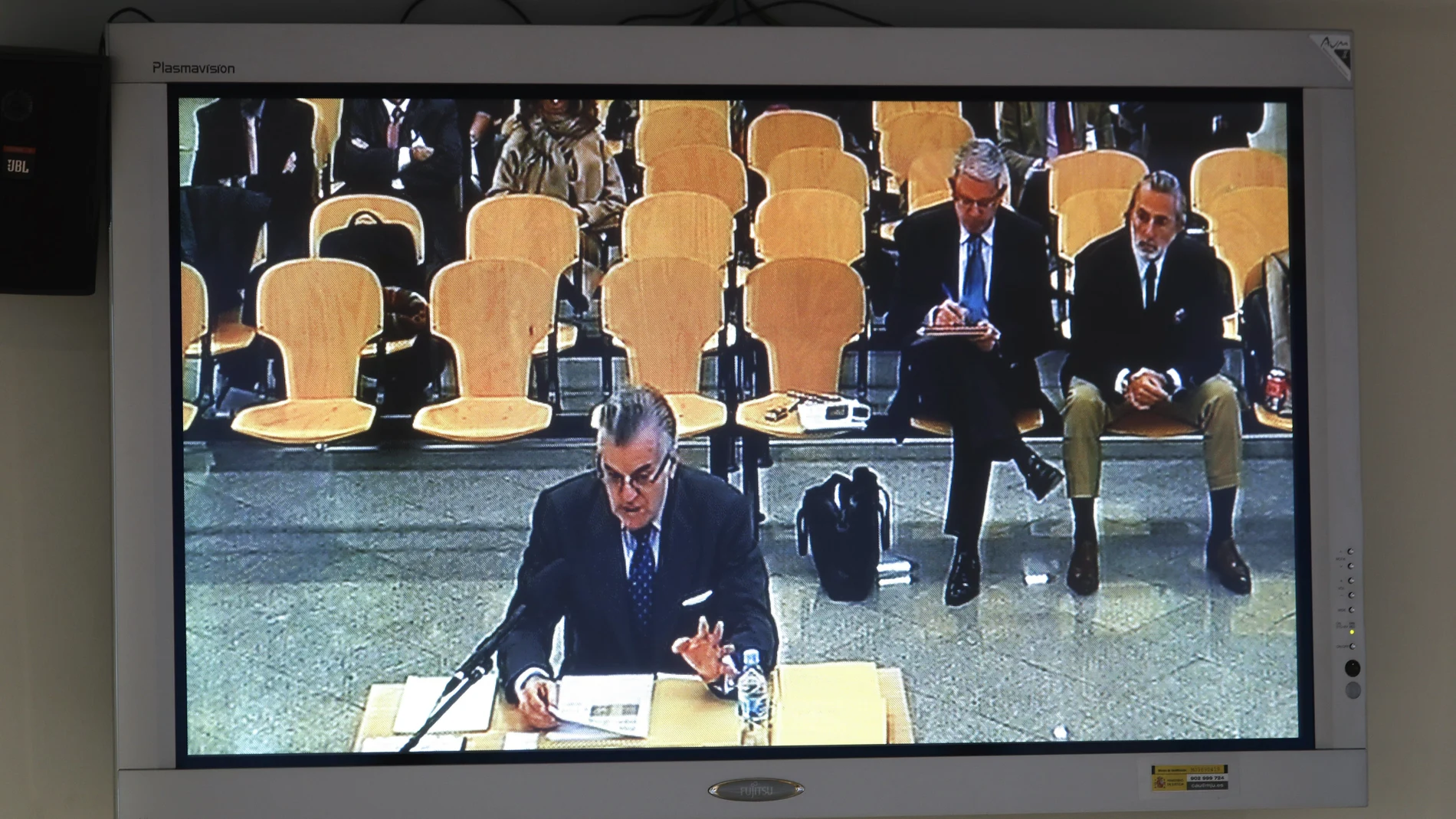 Imagen del monitor instalado en la sala de prensa de la Audiencia Nacional durante la declaración del extesorero del PP Luis Bárcenas