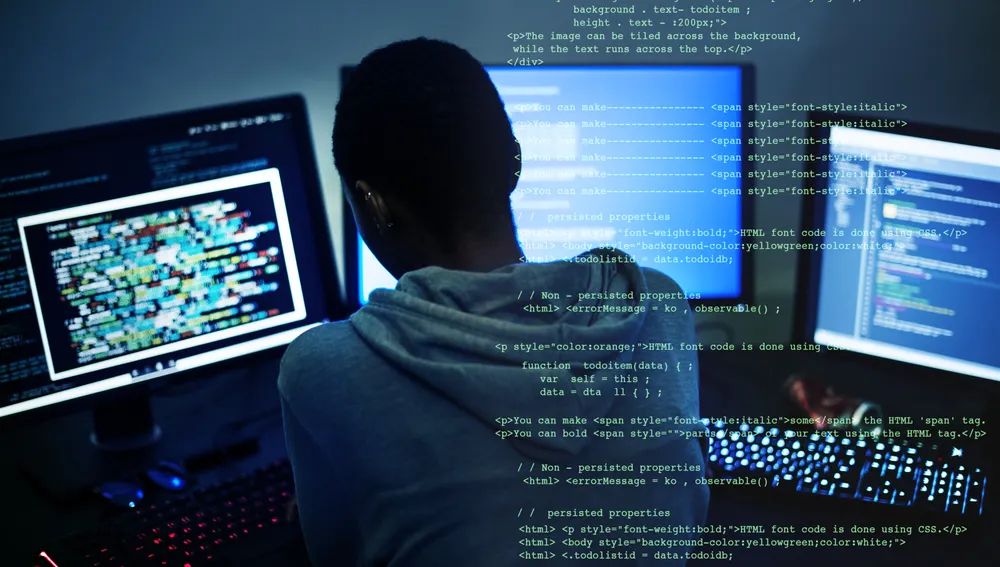 Hacker man working on computer Hombre hacker trabajando en computadora experto en ordenadores