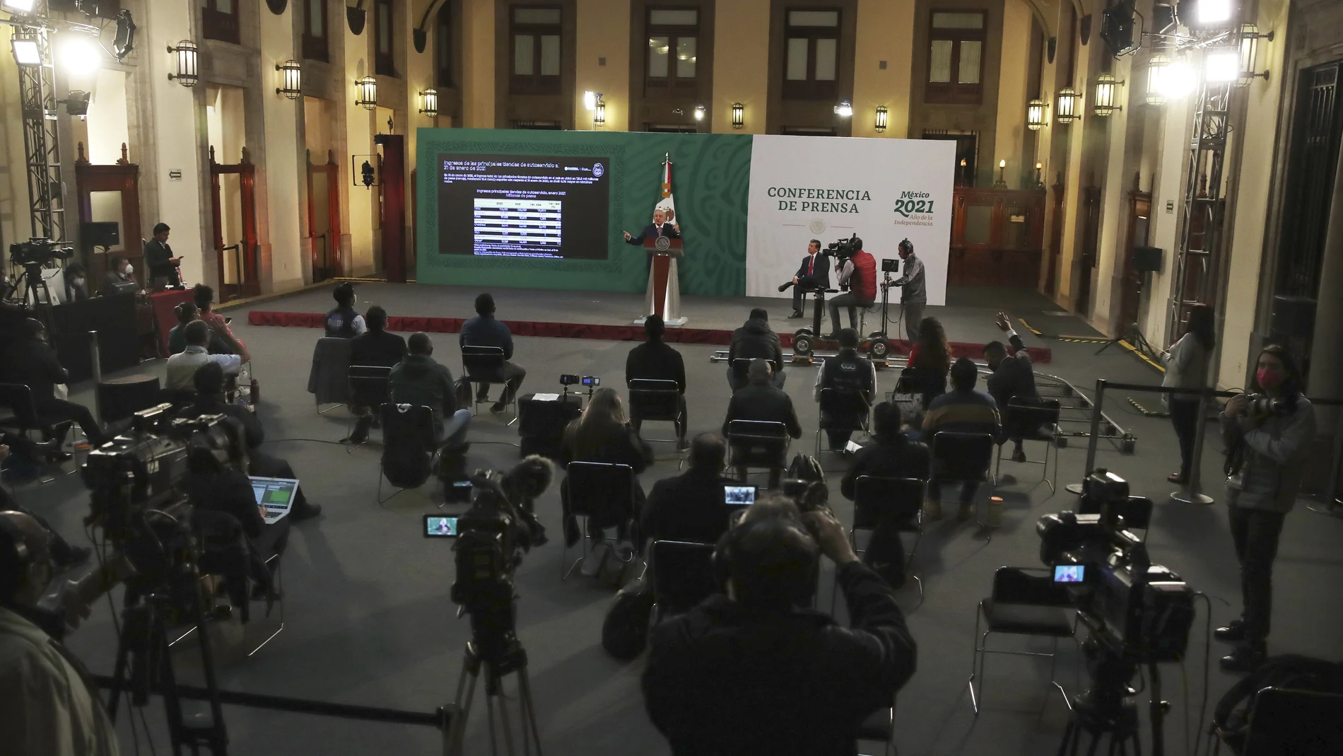 Mexican President AndrÃ©s Manuel LÃ³pez Obrador gives his daily morning press conference following a two-week absence after he tested positive for coronavirus, at the presidential palace, Palacio Nacional, in Mexico City, Monday, Feb. 8, 2021. (AP Photo/Marco Ugarte)
