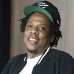FILE - In this July 23, 2019, file photo, Jay-Z makes an announcement of the launch of Dream Chasers record label in joint venture with Roc Nation, at the Roc Nation headquarters in New York. Moet Hennessy is acquiring a 50% stake in the rapper and entrepreneur&#39;s Champagne brand, Armand de Brignac, in an effort to up its cool factor and expand sales. Jay-Z, whose real name is Shawn Carter, said the partnership will help Armand de Brignac grow and flourish.Â Â (Photo by Greg Allen/Invision/AP, File)