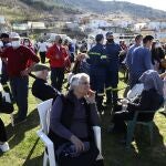 Local residents gather at a soccer field after an earthquake in Mesochori village, central Greece, Wednesday, March 3, 2021. An earthquake with a preliminary magnitude of up to 6.3 struck central Greece on Wednesday and was felt as far away as the capitals of neighboring Albania, North Macedonia, Kosovo and Montenegro. (AP Photo/Vaggelis Kousioras)