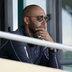 Miami Marlins CEO Derek Jeter watches during a spring training baseball game against the Houston Astros, Friday, March 5, 2021, in Jupiter, Fla. (AP Photo/Lynne Sladky)