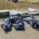 Cadáveres dentro de una bolsa tras la explosión en Bata, el domingo