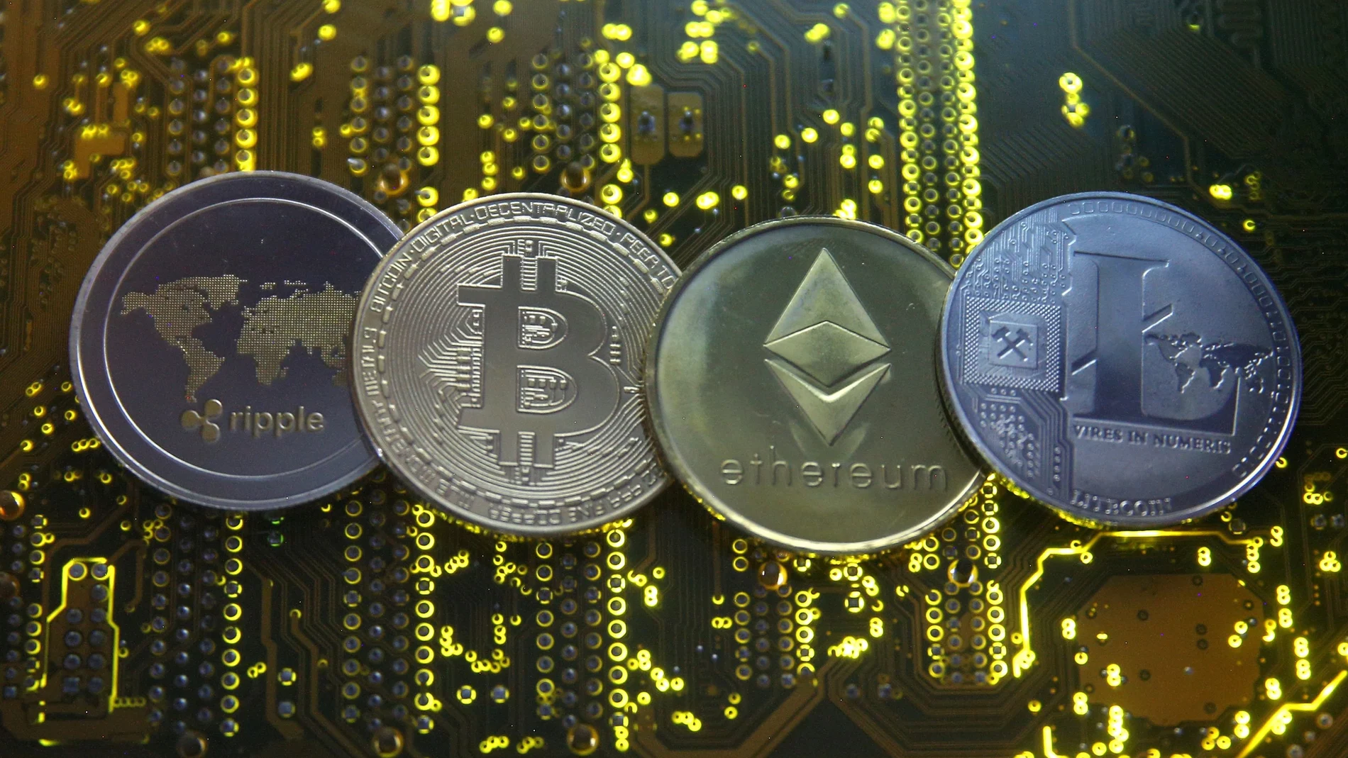 Representaciones de Ripple, Bitcoin, Ethereum y Litecoin, varias de las criptomonedas más importantes