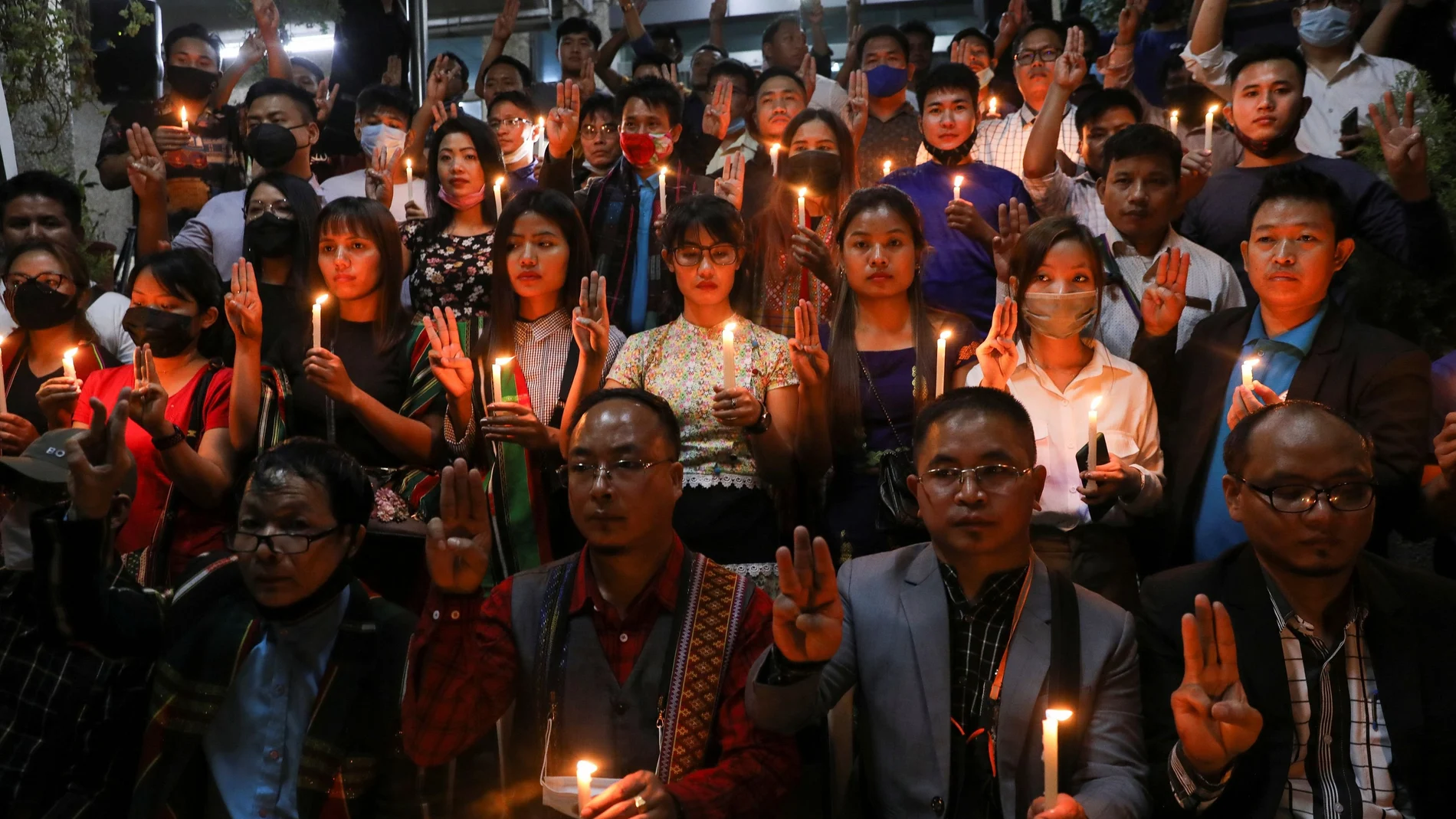 Myanmar citizens living in India and members of Mizo Zirlai Pawl (MZP), a student organisation from India's Mizoram state, hold a candle vigil to pay tribute to people who died in Myanmar after the military coup, in New Delhi, India, March 23, 2021. REUTERS/Anushree Fadnavis