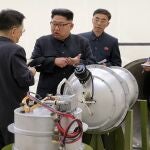 FILE - This undated file photo distributed by the North Korean government shows North Korean leader Kim Jong Un, center, at an undisclosed location in North Korea. (Korean Central News Agency/Korea News Service via AP, File)