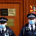 Police officers stand guard outside the Myanmar Embassy in London, Britain, April 8, 2021. REUTERS/Toby Melville