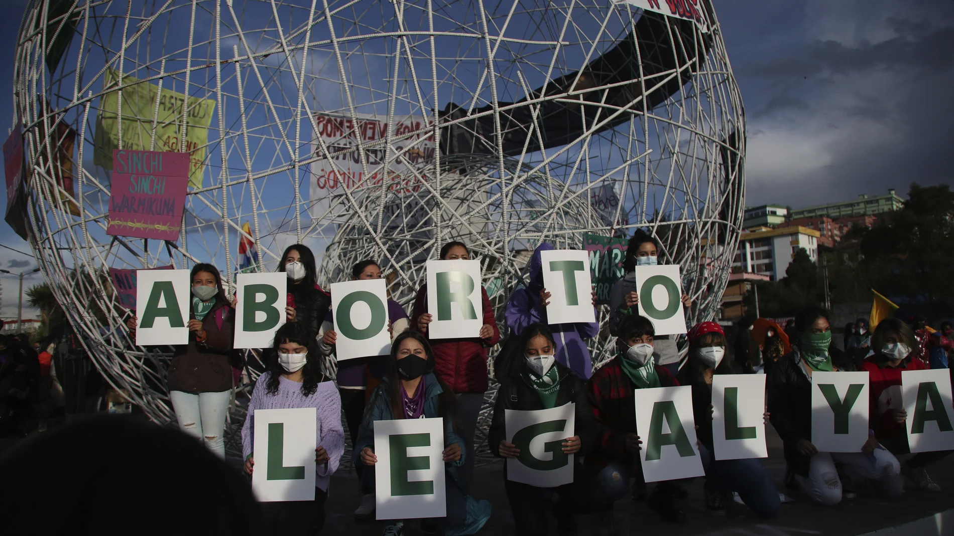 FILE - In this Sept. 28, 2020 file photo, women hold letters forming the phrase "Legal Abortion Now" during an abortion-rights protest in Quito, Ecuador. The South American country’s constitutional court ruled on Wednesday, April 28, 2021, in favor of decriminalizing abortion in the case of rape.(AP Photo/Dolores Ochoa, File)