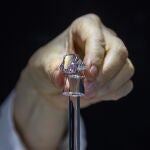 Hong Kong (China), 20/05/2021.- A woman holds the Sakura Diamond during preview at Christie's in Hong Kong, China, 20 May 2021. The 15.81 Carat Fancy Vivid Purple Pink Internally Flawless Type lla Diamond Ring will be auctioned in Hong Kong on 23 May 2021 for an estimated 25 million to 38 million US dollars. EFE/EPA/JEROME FAVRE