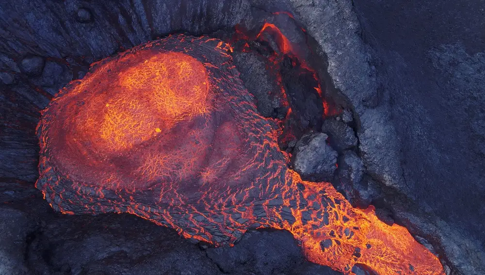 Lava flows out of the Fagradalsfjall in Iceland May 24, 2021 in this still image from social media video taken with a drone on May 24, 2021. Prof. Sigurjon Jonsson, KAUST/via REUTERS THIS IMAGE HAS BEEN SUPPLIED BY A THIRD PARTY. MANDATORY CREDIT. NO RESALES. NO ARCHIVES.