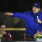 FILE - In this March 21, 2019 file photo, Nicaragua's President Daniel Ortega speaks next to first lady and Vice President Rosario Murillo during the inauguration ceremony of a highway overpass in Managua, Nicaragua. Nicaraguaâ€™s National Police have arrested on Tuesday, June 8, 2021, two more potential challengers to President Ortega, the third and fourth opposition pre-candidates for the Nov. 7 elections detained in the past week. (AP Photo/Alfredo Zuniga, File)