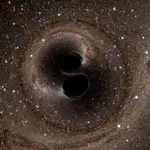 Dos agujeros negros en órbita mutua.