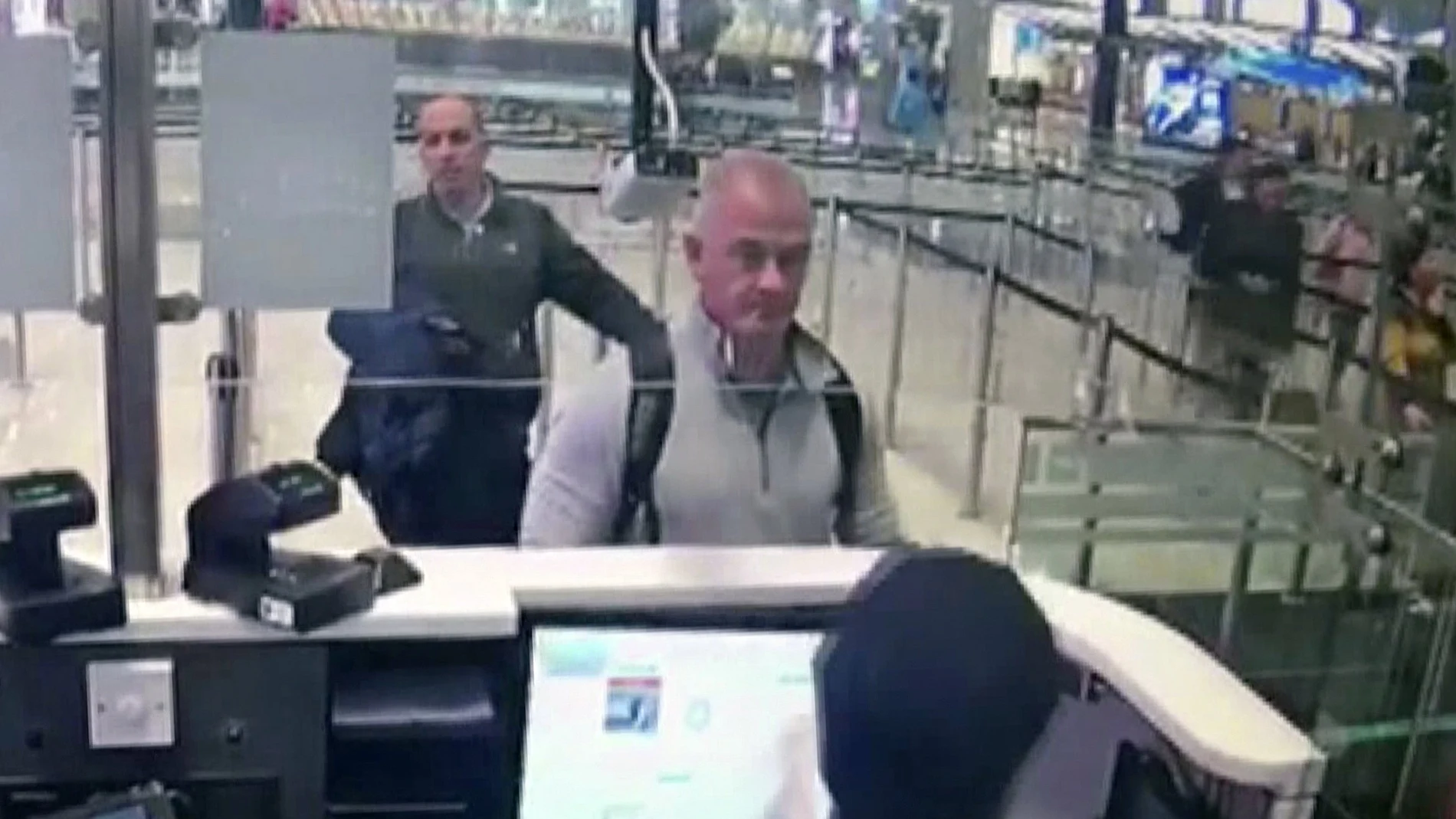 FILE â€” This Dec. 30, 2019, image from security camera video shows Michael L. Taylor, center, and George-Antoine Zayek at passport control at Istanbul Airport in Turkey. A Tokyo court handed down prison terms for the American father Michael Taylor and son Peter accused of helping Nissanâ€™s former chairman, Carlos Ghosn, escape to Lebanon while awaiting trial in Japan.(DHA via AP, File)