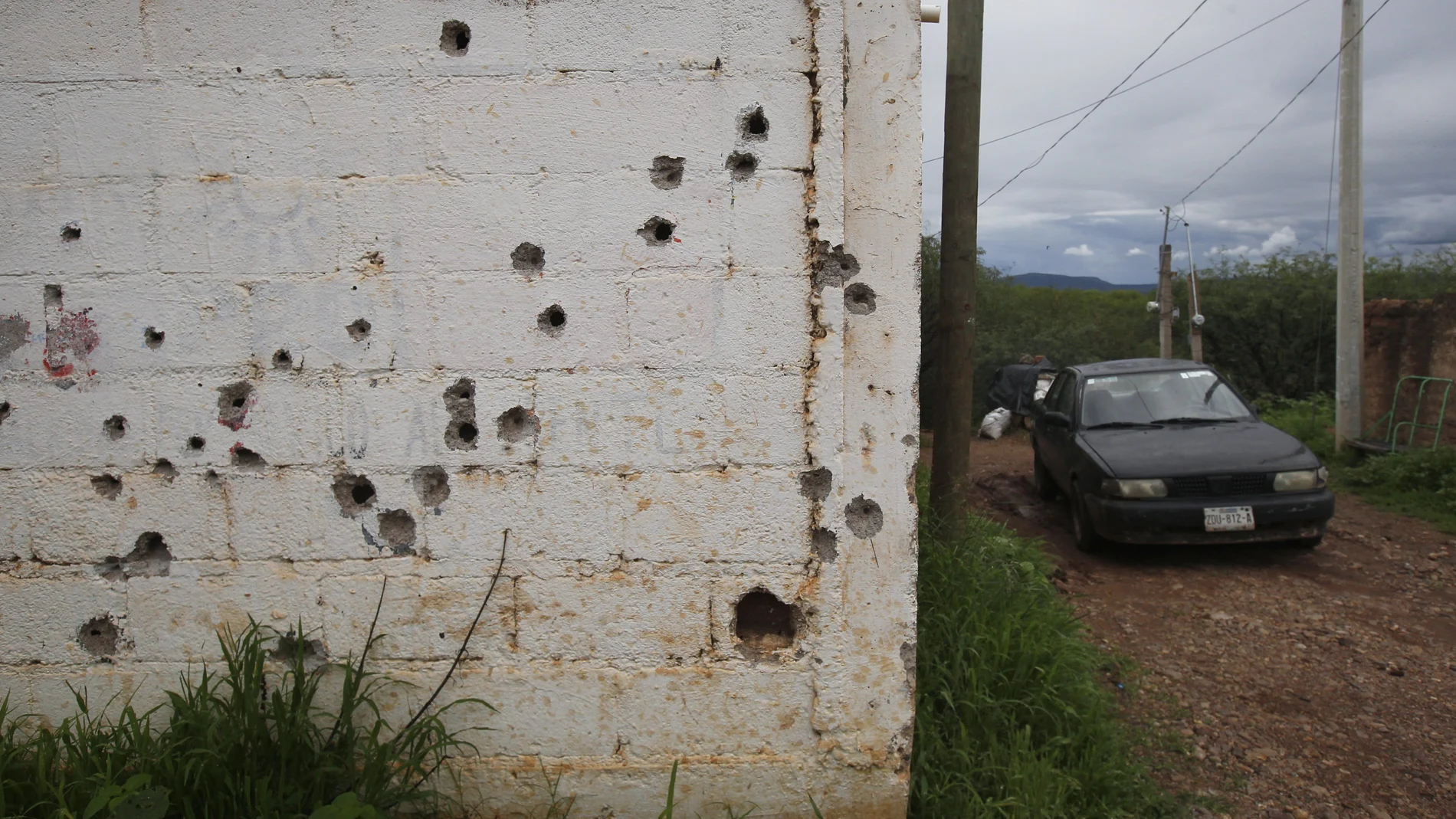 Bullet holes scar a homeâ€™s exterior wall, on the outskirts of the municipality of Valparaiso, Zacatecas state, Mexico, Wednesday, July 14, 2021. President Andres Manuel Lopez Obrador recognized that violence remains a problem. "If we don't manage to pacify Mexico, regardless of what has been done, we are not going to be able to historically prove our government," he said. (AP Photo/Marco Ugarte)
