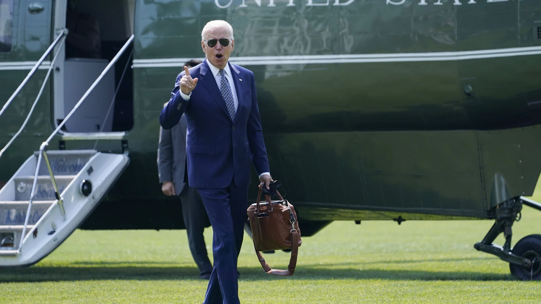 President Joe Biden arrives on the South Lawn of the White House, Tuesday, Aug. 10, 2021, in Washington. (AP Photo/Evan Vucci)