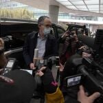 FILE - In this file photo dated Wednesday, Feb. 10, 2021, Peter Ben Embarek of a World Health Organization team speaks to journalists as he arrives at the airport to leave, at the end of their WHO mission to investigate the origins of the coronavirus pandemic in Wuhan in central China's Hubei province. When WHO traveled to China earlier this year to investigate the origins of the COVID-19 pandemic, Peter Ben Embarek said he was worried about biosafety standards at a laboratory close to the market where the first human cases were detected, according to a documentary released Thursday Aug. 12, 2021, by TV2, a Danish television channel. (AP Photo/Ng Han Guan, FILE)
