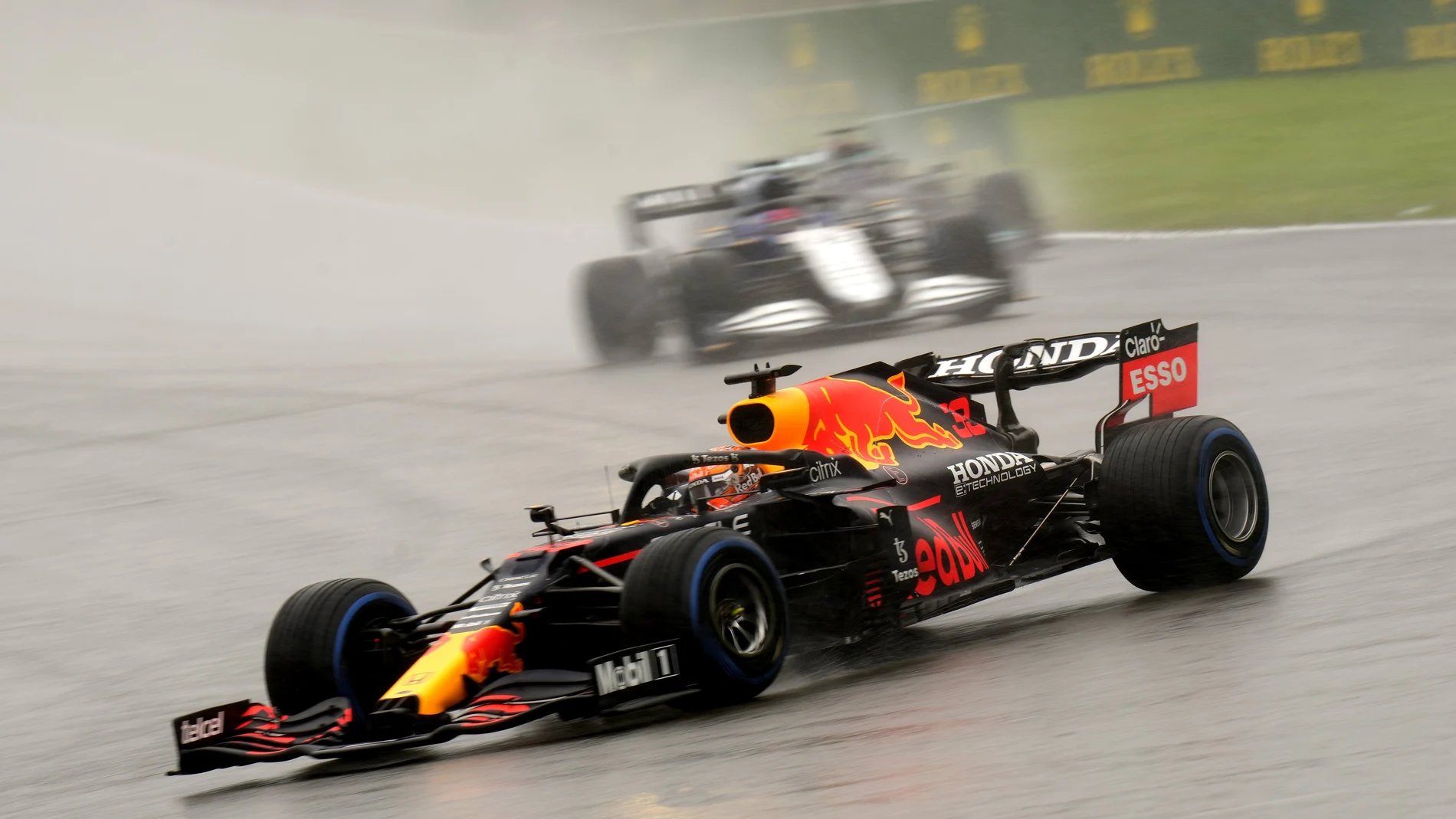 Red Bull driver Max Verstappen of the Netherlands steers his car behind the safety car during the Formula One Grand Prix at the Spa-Francorchamps racetrack in Spa, Belgium, Sunday, Aug. 29, 2021. (AP Photo/Francisco Seco)