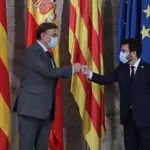 El presidente de la Generalitat valenciana, Ximo Puig, y el presidente de la Generalitat de Cataluña, Pere Aragonés, esta mañana en Valencia
