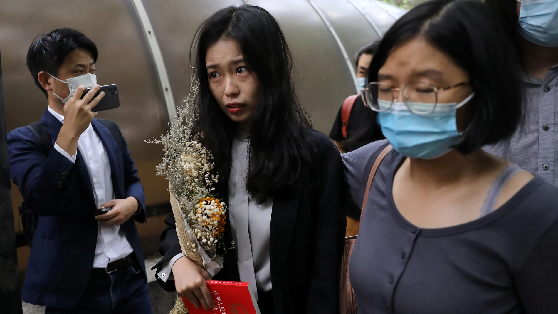 Zhou Xiaoxuan, also known by her online name Xianzi, arrives at a court for a sexual harassment case involving a Chinese state TV host, in Beijing, China September 14, 2021. REUTERS/Tingshu Wang