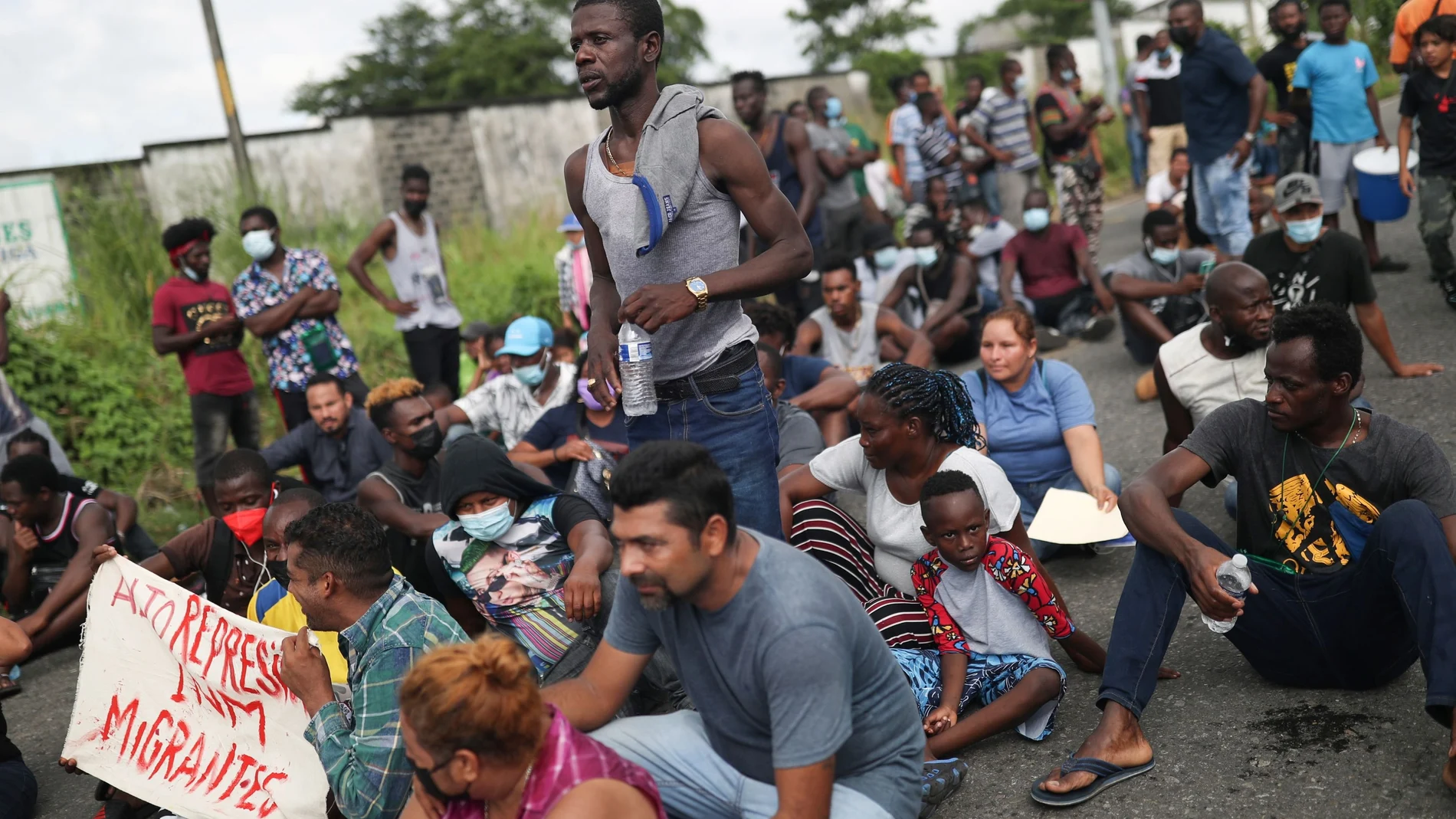 Activists and migrants from Haiti take a break as they march to the National Migration Institute to claim for their rights, in Tapachula, Chiapas state, Mexico September 15, 2021. REUTERS/Edgard Garrido?