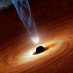 Un agujero negro alimentándose del disco de gas y polvo que lo rodea.