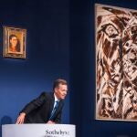 Auctioneer Oliver Barker, Chairman of Sotheby's Europe, sells a Frida Kahlo self portrait for $34.9 Million USD during an art auction, in the Manhattan borough of New York City, New York, U.S., November 16, 2021. Julian Cassady/SOTHEBY'S/Handout via REUTERS ATTENTION EDITORS - THIS IMAGE HAS BEEN SUPPLIED BY A THIRD PARTY