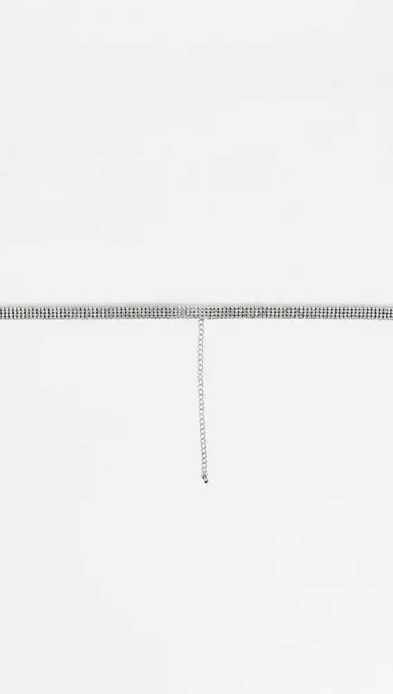 Cinturón plateado estilo cadena estrecha con incrustaciones de strass, de Asos Design