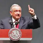 Mexico?s President Andres Manuel Lopez Obrador speaks on the third anniversary of his government in Mexico City, Mexico December 1, 2021. REUTERS/Henry Romero