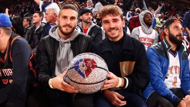 Koke y Griezmann, en las gradas del Garden