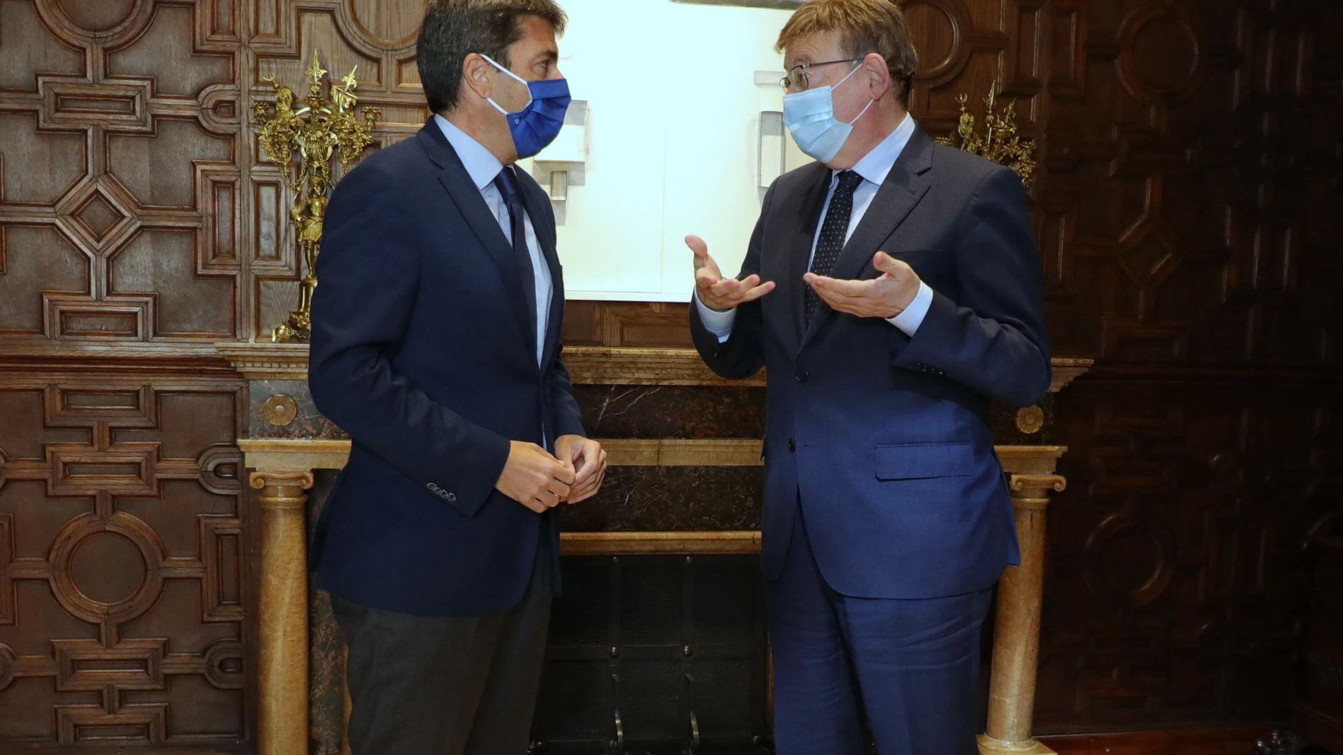 El president de la Generalitat, Ximo Puig, durante el encuentro realizado este lunes con el presidente del PP de la Comunitat Valenciana, Carlos Mazón