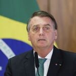 FILE - Brazil's President Jair Bolsonaro speaks during a joint press conference Paraguay's president at the Planalto Palace in Brasilia, Brazil, Nov. 24, 2021. Bolsonaro was taken to a Sao Paulo hospital early Monday, Jan. 3, 2022, with a suspected intestinal obstruction, the countryâ€™s media reported. (AP Photo/Raul Spinasse, File)