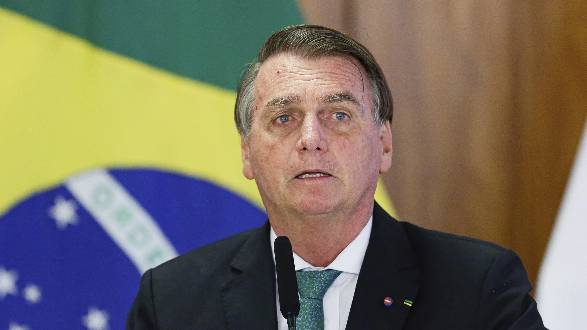 FILE - Brazil's President Jair Bolsonaro speaks during a joint press conference Paraguay's president at the Planalto Palace in Brasilia, Brazil, Nov. 24, 2021. Bolsonaro was taken to a Sao Paulo hospital early Monday, Jan. 3, 2022, with a suspected intestinal obstruction, the country’s media reported. (AP Photo/Raul Spinasse, File)