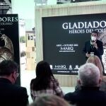 El presidente de la Diputación de Alicante, Carlos Mazón, interviene en la presentación de la próxima exposición del Museo Arqueológico de Alicante (MARQ), "Gladiadores. Héroes del Coliseo" en el stand de la Comunitat Valenciana de FITUR