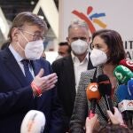 El presidente de la Generalitat, Ximo Puig y la ministra de Industria, Comercio y Turismo, Reyes Maroto, ofrecen declaraciones a los medios, en el Día de la Comunitat Valenciana en Fitur