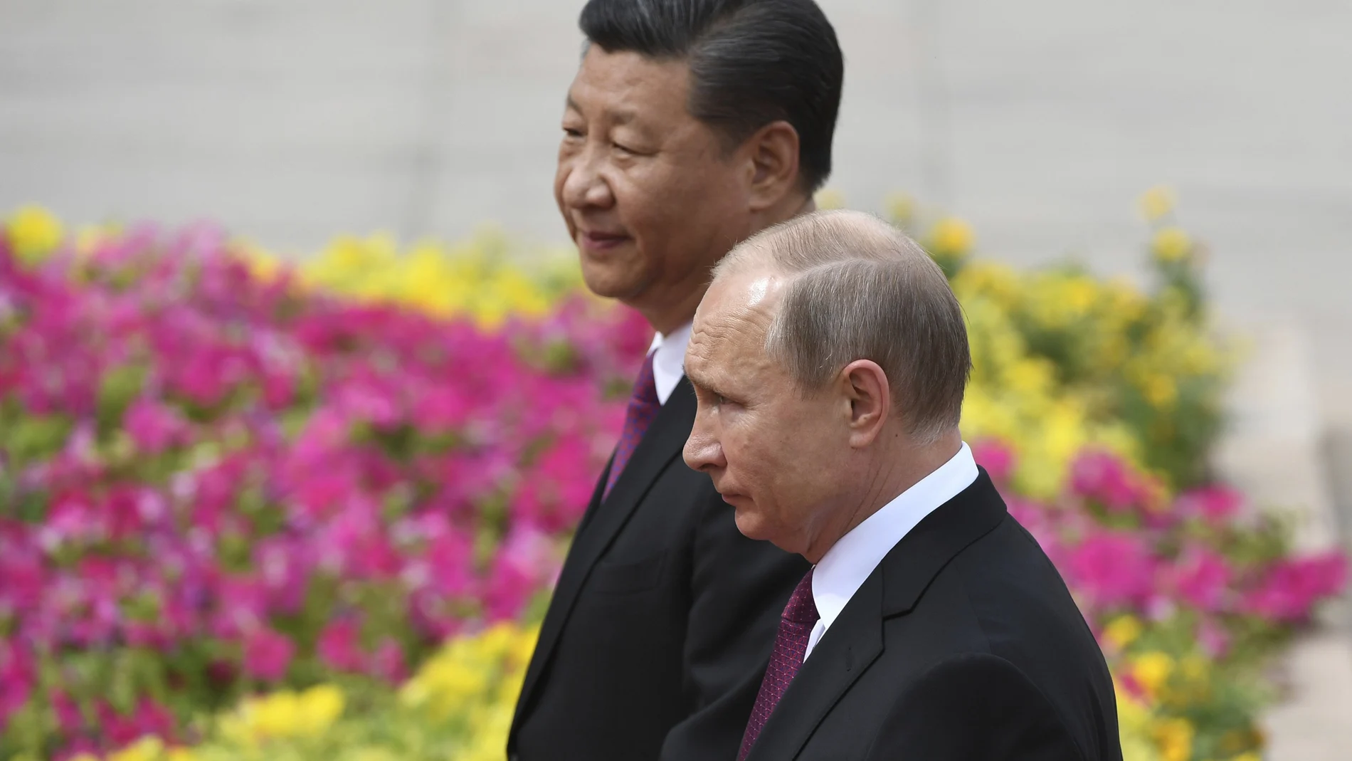 Los presidentes Xi Jinping Vladimir Putin en un encuentro en 2018