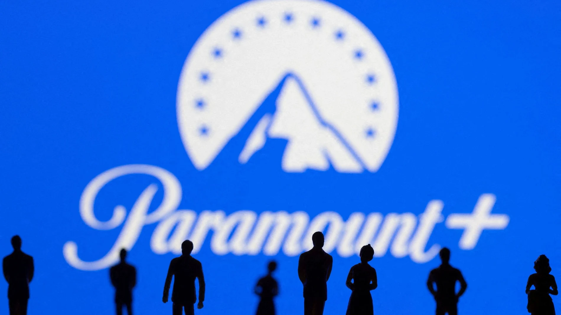 FILE PHOTO: Toy figures of people are seen in front of the displayed Paramount + logo, in this illustration taken January 20, 2022. REUTERS/Dado Ruvic/Illustration/File Photo