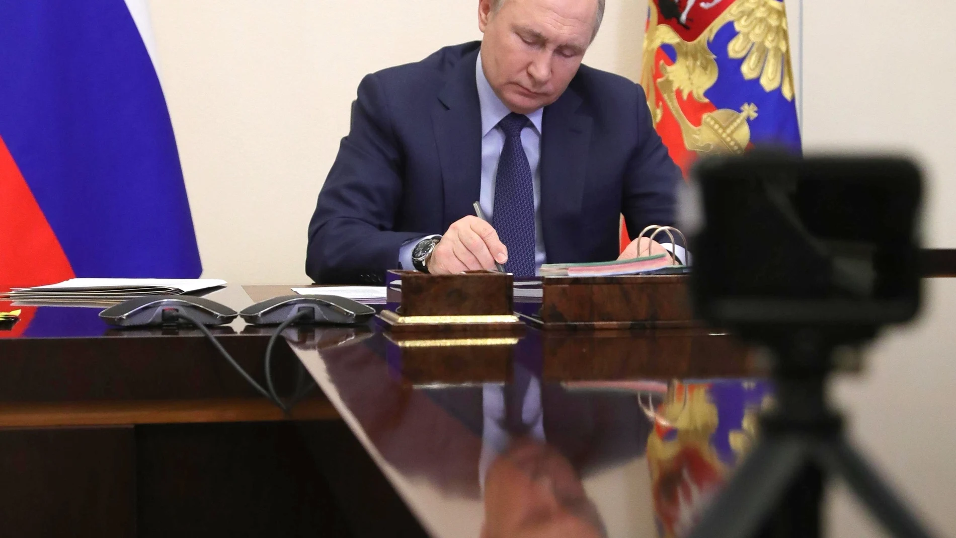 FILE - Russian President Vladimir Putin attends a meeting via videoconference in Moscow, Russia, March 25, 2022. (Mikhail Klimentyev/Sputnik, Kremlin Pool Photo via AP, File)