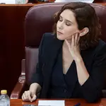La presidenta de la Comunidad de Madrid, Isabel Díaz Ayuso, en el pleno de la Asamblea de Madrid