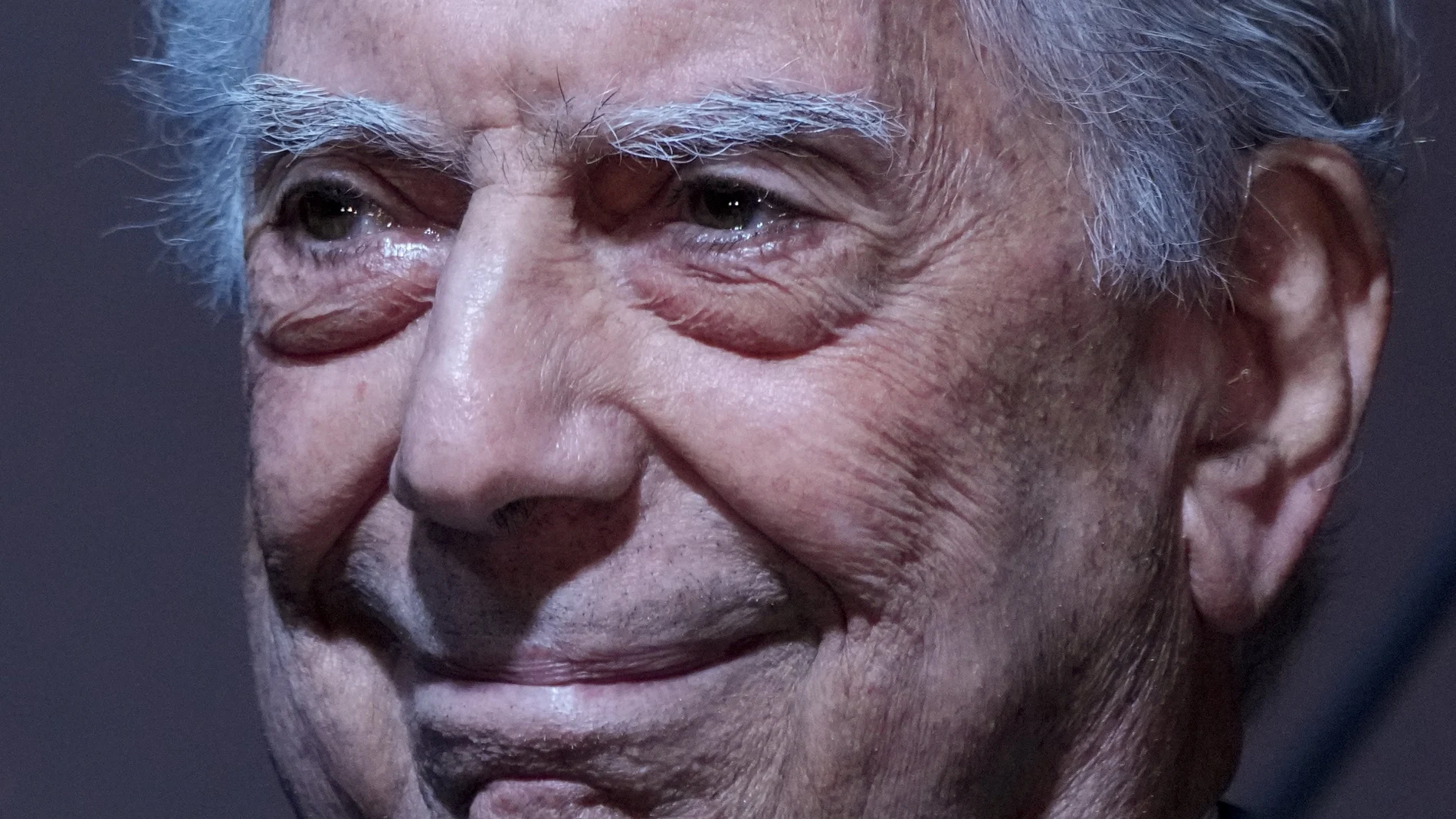 Peruvian writer Mario Vargas Llosa smiles while attending the 46th edition of the International Book Fair in Buenos Aires, Argentina, Friday, May 6, 2022. (AP Photo/Natacha Pisarenko)