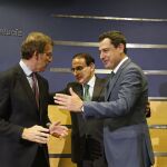 El presidente del PP, el presidente de la CEA y el presidente de la Junta de Andalucía