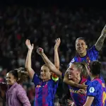 Barcelona players celebrate their win against Real Madrid during the Women&#39;s Champions League quarter final, second leg soccer match between Barcelona and Real Madrid at Camp Nou stadium in Barcelona, Spain, on March 30, 2022. Ada Hegerbergâ€™s comeback season has her and her Lyon teammates back in yet another Womenâ€™s Champions League final. The seven-time champions will face defending titlist Barcelona in Turin on Saturday in a repeat of the 2019 final.