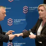 French far-right Rassemblement National party (RN) leader Marine Le Pen (R) and Hungarian Prime Minister Viktor Orban (L) before the Leaders European conservative and right-wing parties meeting &#39;The Warsaw Summit&#39; at the Regent Hotel in Warsaw, Poland