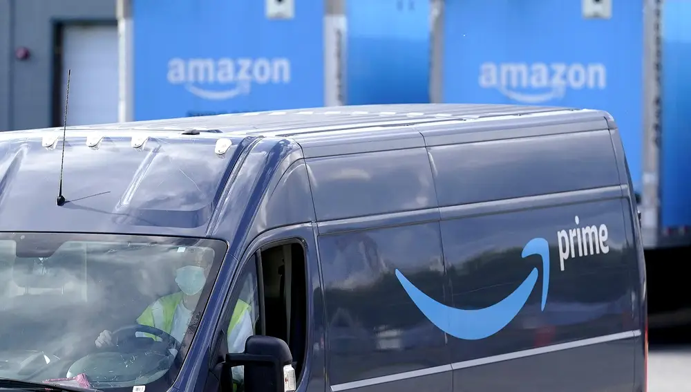 FILE - An Amazon Prime logo is seen on the side of a delivery van as it departs an Amazon Warehouse location on Oct. 1, 2020, in Dedham, Mass. Amazon will be offering discounts on a variety of items during its two-day Prime Day shopping event that began Tuesday, July 12, 2022. Consumers are searching for the best deals they can find, including time-sensitive deals that are offered on the site for a short period of time. (AP Photo/Steven Senne, File)