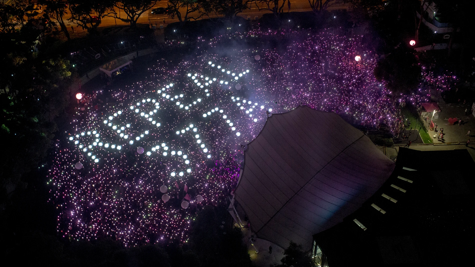 Una vista general muestra las palabras "Derogar 377A" en referencia a la ley que penaliza los actos sexuales entre personas del mismo sexo durante el acto Pink Dot celebrado en el Speaker's Corner en Hong Lim Park, en 2019, en Singapur,