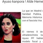 Imagen de una web de Ayuso, objetivo de los ataques del entorno de la izquierda abertzale, con una bandera preconstitucional al fondo