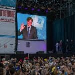 El expresidente de la Generalitat, Carles Puigdemont, durante la manifestación para conmemorar el quinto aniversario del 1-O
