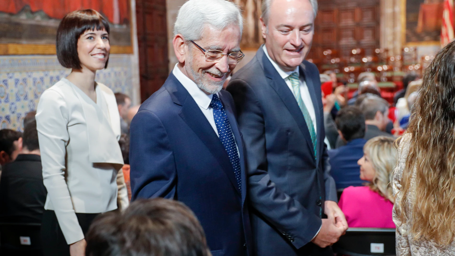 Los expresidentes Joan Lerma y Alberto Fabra junto a la ministra Diana Morant al inicio del acto institucional que se celebra en el Palau con motivo del 9 d'Octubre, Día de la Comunitat Valenciana.