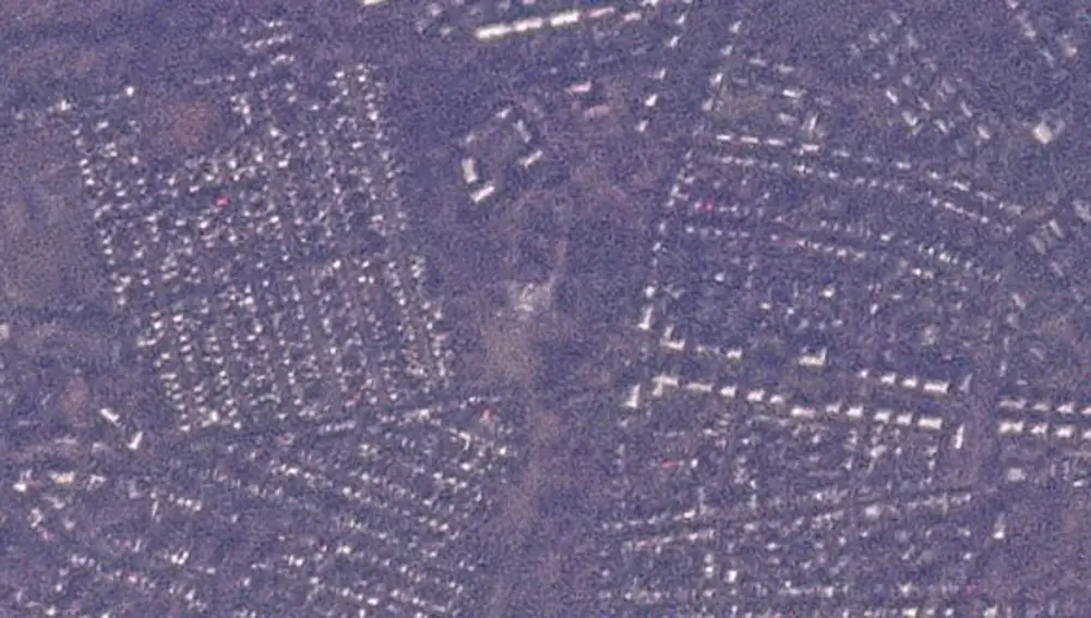 Esta foto de satélite de Planet Labs PBC muestra los restos de una escuela de formación profesional en la ciudad de Makiivka
